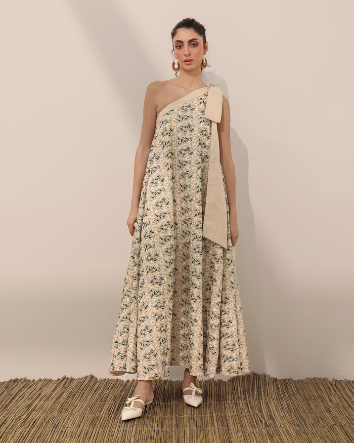 One shoulder flowy dress in linen with embroidered daisy flowers