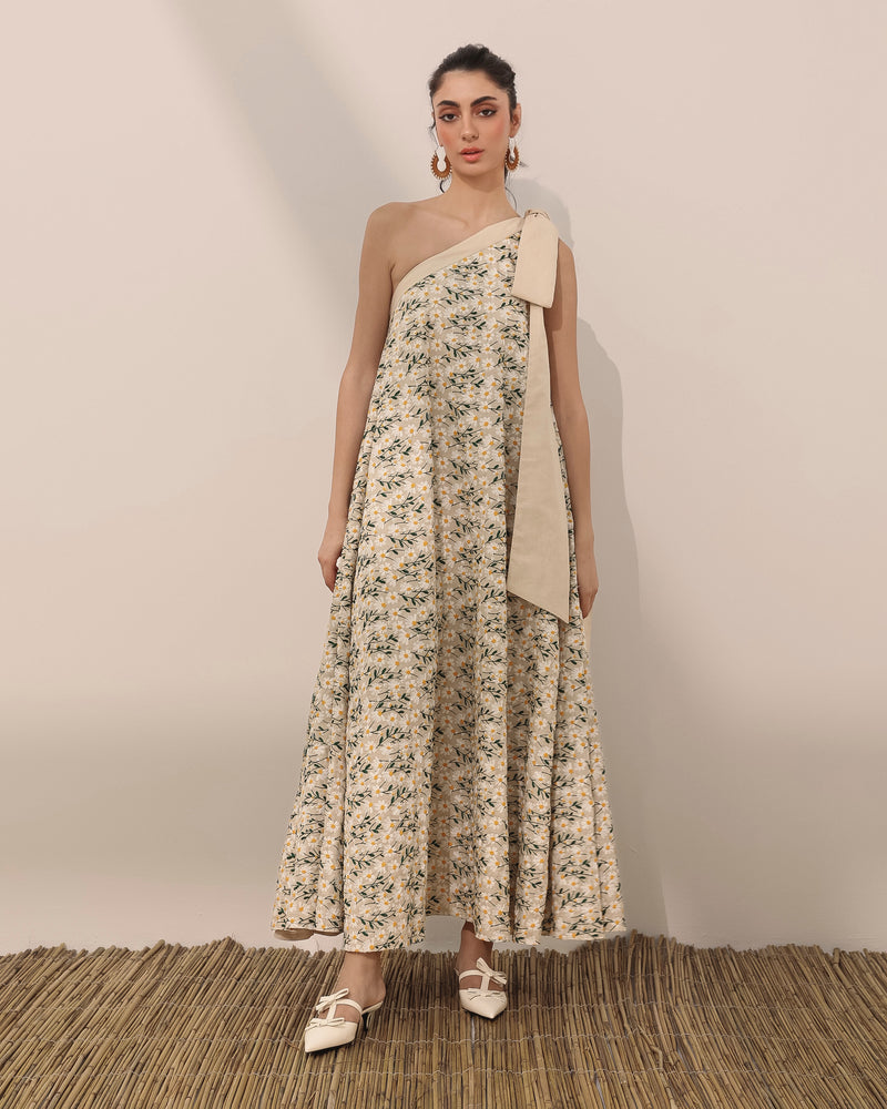 One shoulder flowy dress in linen with embroidered daisy flowers
