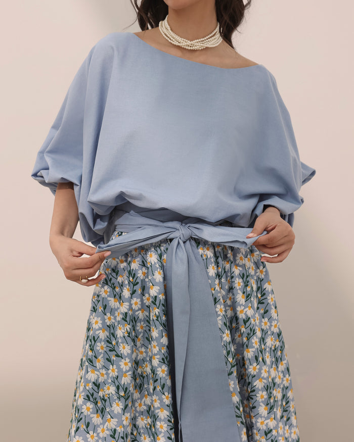 Plain linen top in boat neck and gathered cuff sleeves