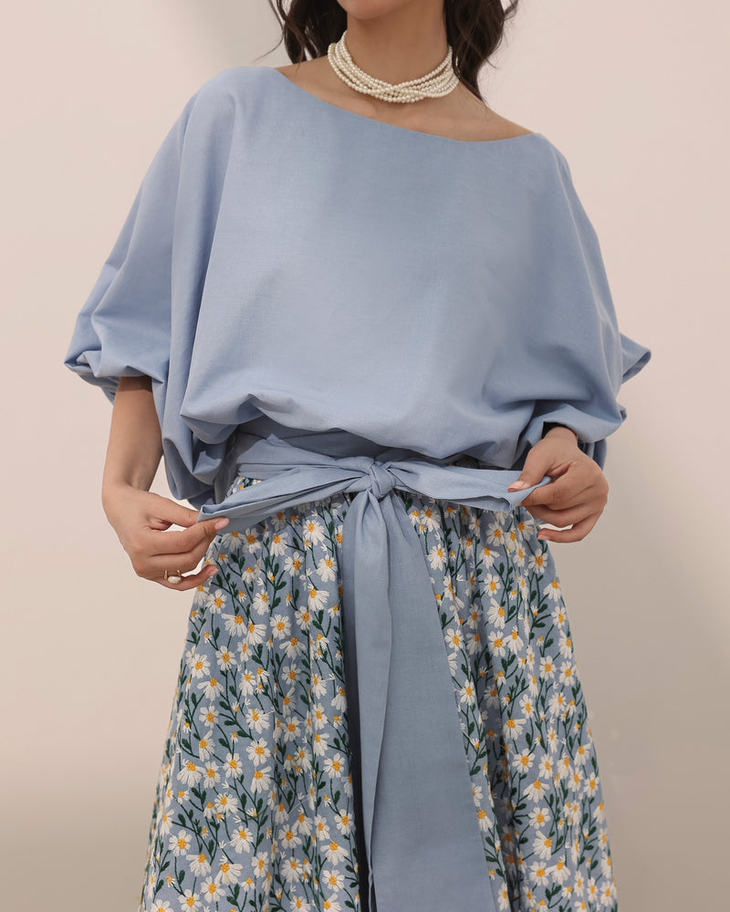 Plain linen top in boat neck and gathered cuff sleeves
