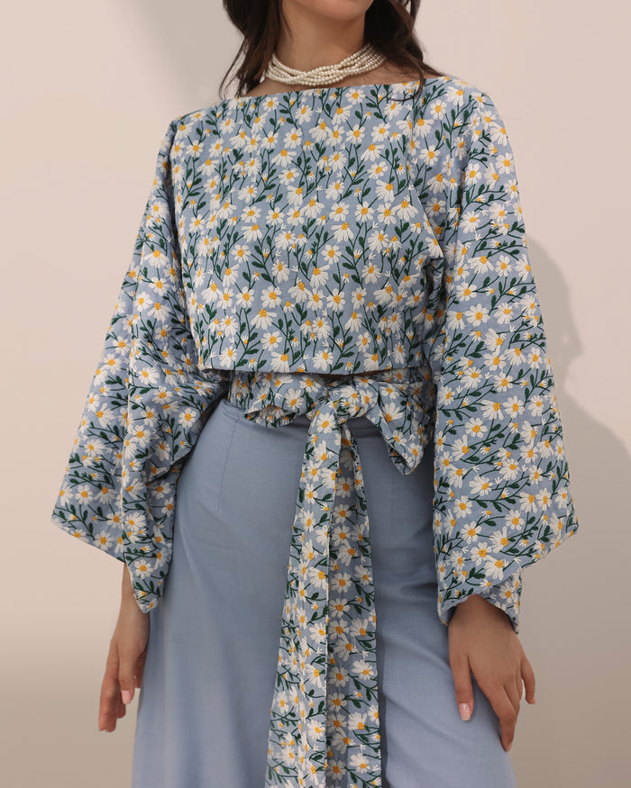 Cropped linen top w/ embroidered daisy flowers, boat neck and wide sleeves