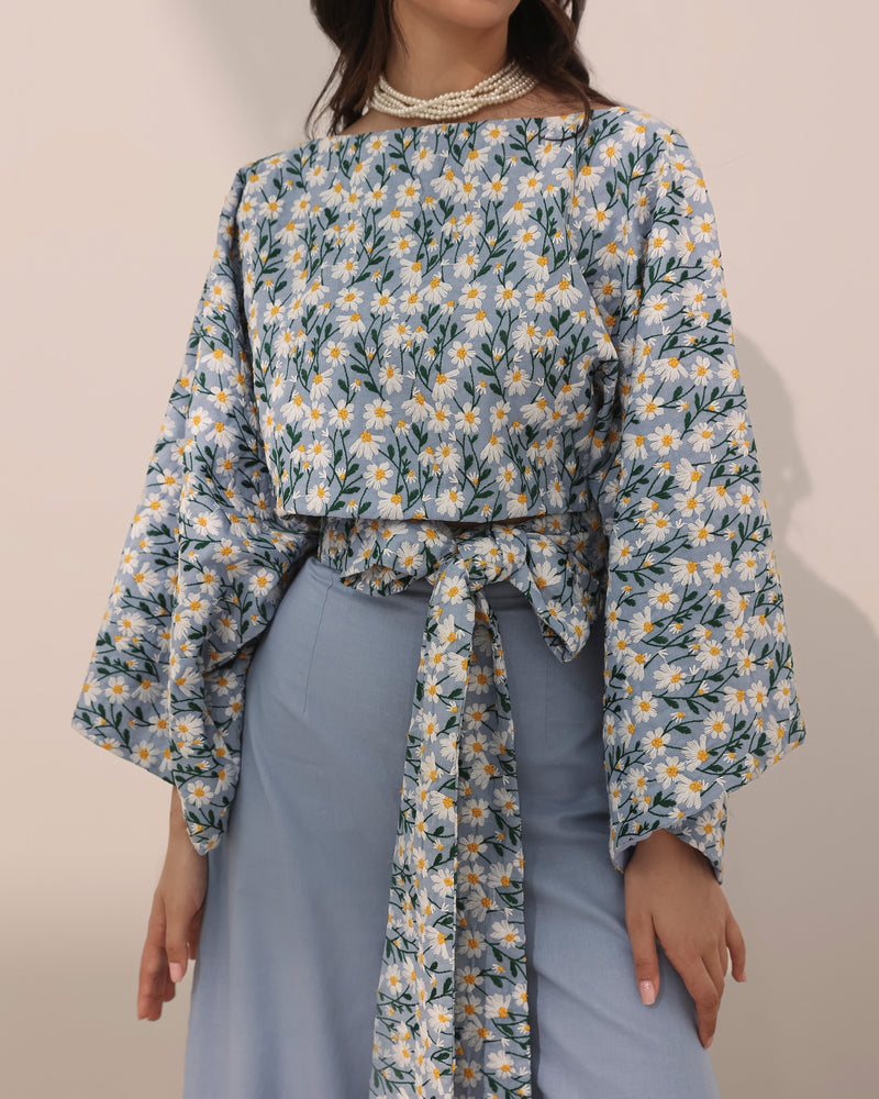Cropped linen top w/ embroidered daisy flowers, boat neck and wide sleeves