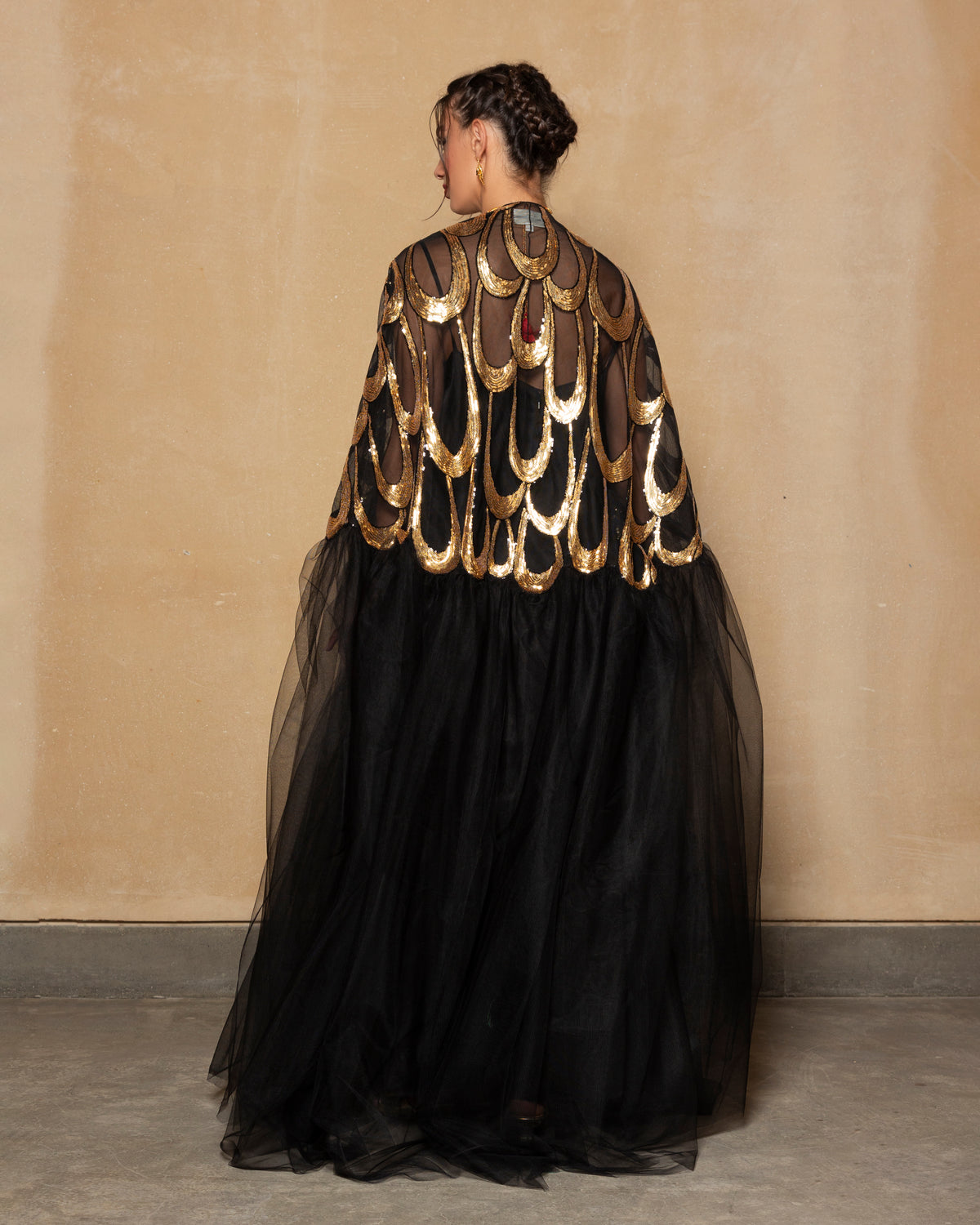 Embroidered tulle abaya in gold + black with cape sillhoute