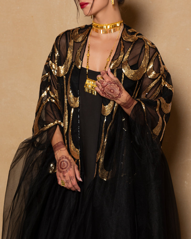 Embroidered tulle abaya in gold + black with cape sillhoute