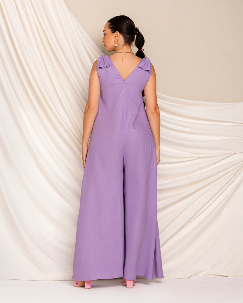 Sleeveless linen jumpsuit with bow on shoulder