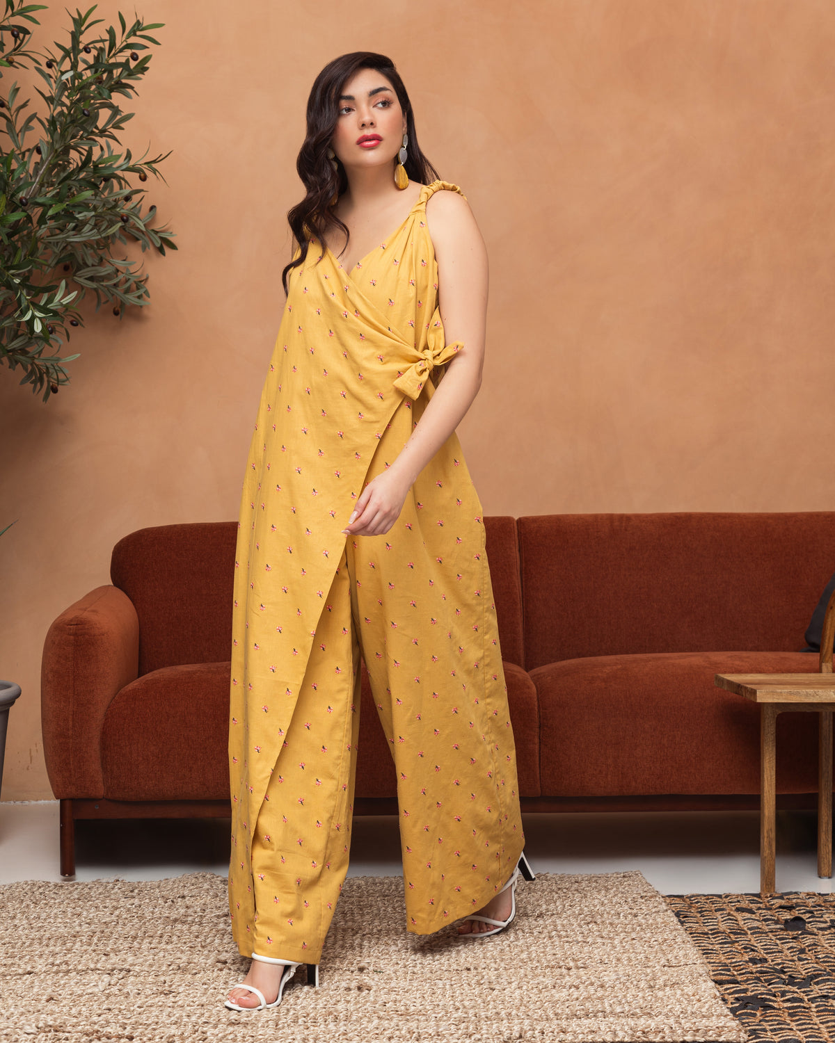 Sleeveless overlapped cotton jumpsuit with mini embroidered flowers