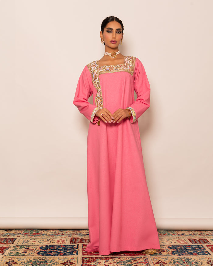 Linen kaftan embellished with traditional trimmed neckline