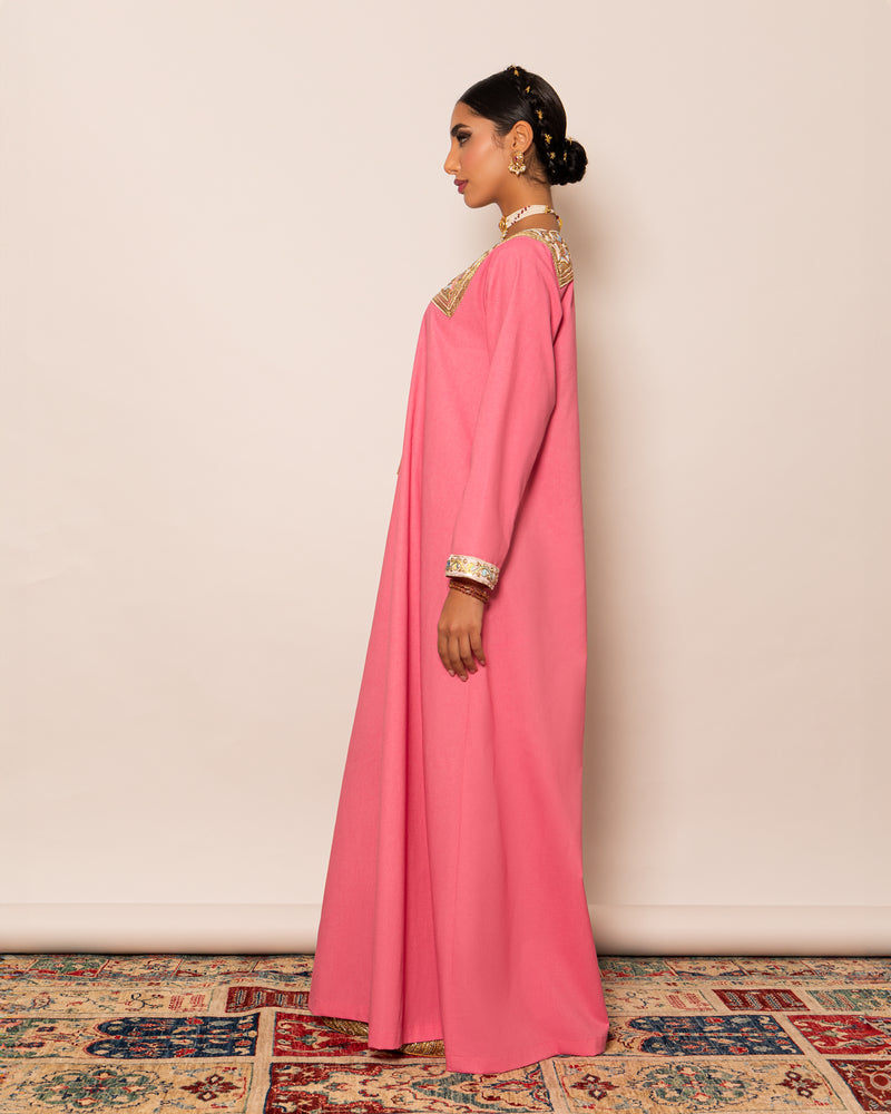 Linen kaftan embellished with traditional trimmed neckline