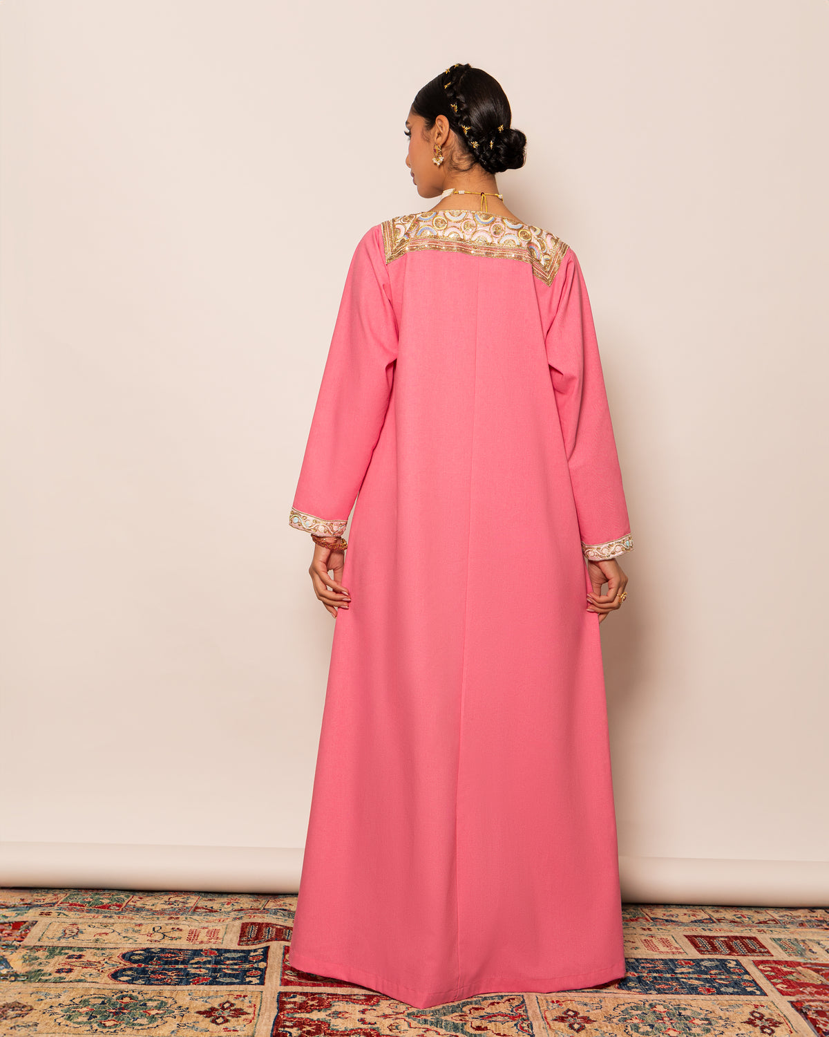 Linen kaftan embellished with traditional trimmed neckline