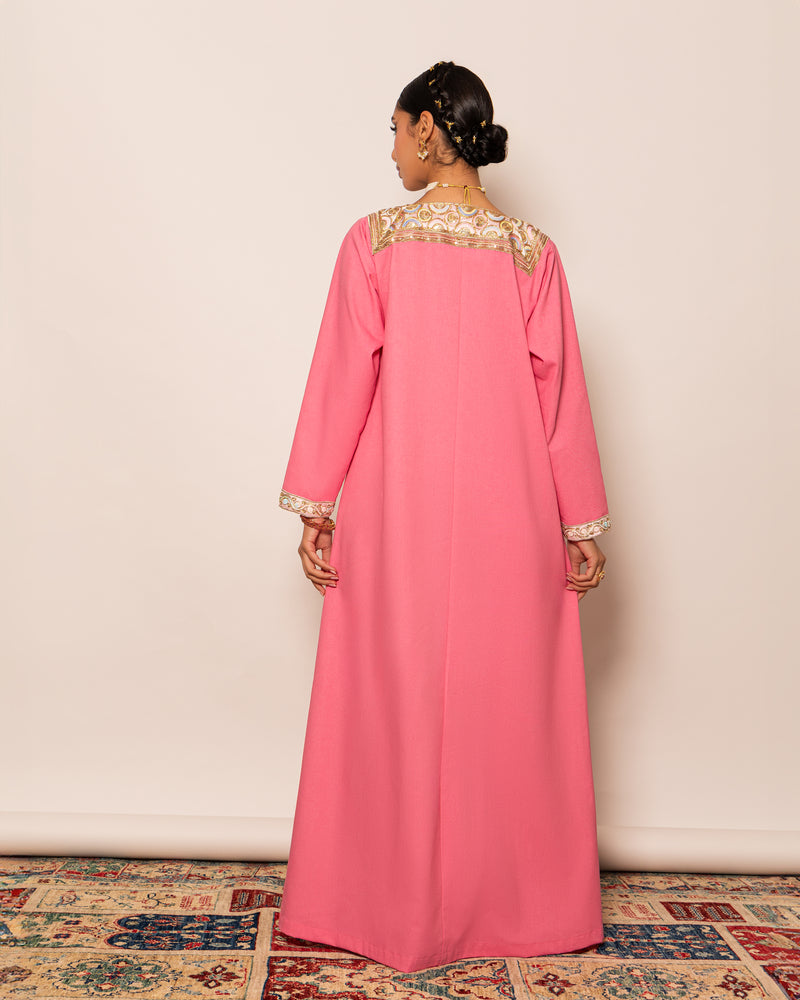Linen kaftan embellished with traditional trimmed neckline