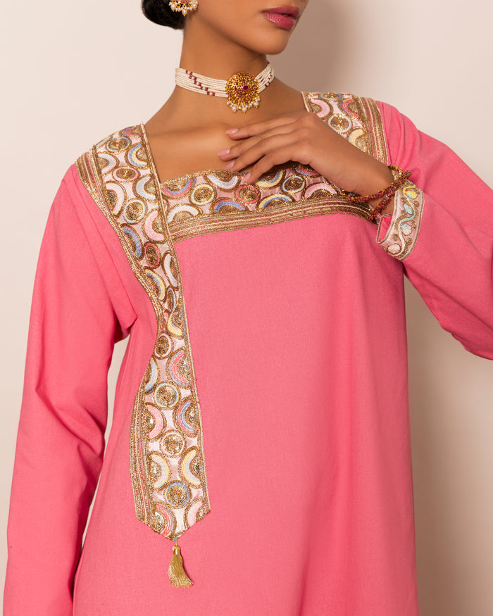 Linen kaftan embellished with traditional trimmed neckline