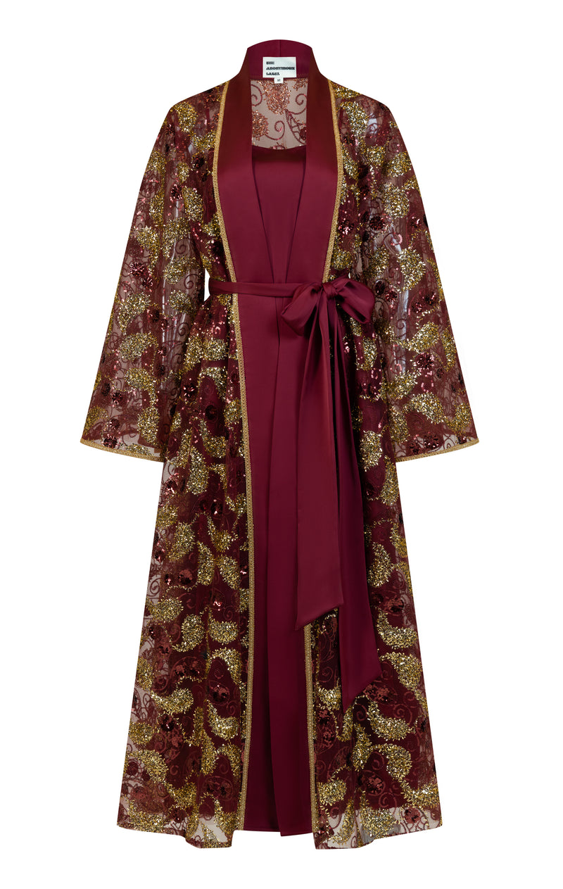 Two piece set of long sleeves classic cut abaya with a slik satin inner dress