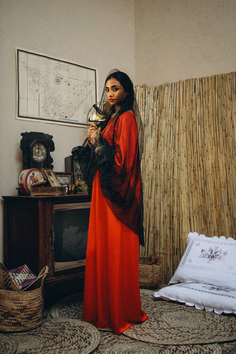 Traditional kaftan in silk with semi puffed sleeve with trimmings in cuff and neckline